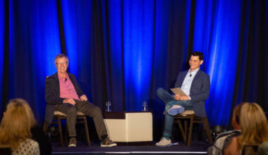 Nomadic Matt interviewing Tony Wheeler at TravelCon 2019 in Boston