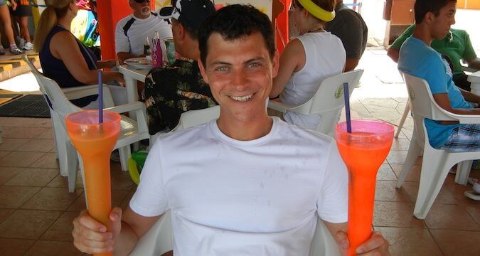 nomadic matt on his cruise drinking frozen drinks