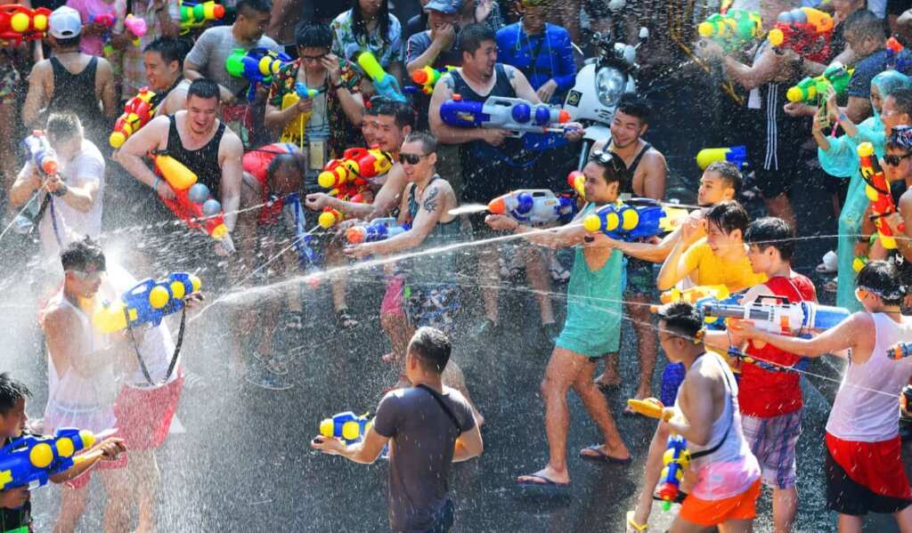 People having a water fight during Songkran, the Thai New Year