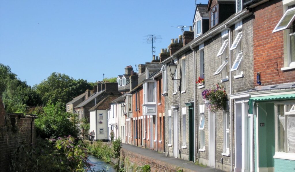 A line of colorful row houses along a canal in Salisbury, England