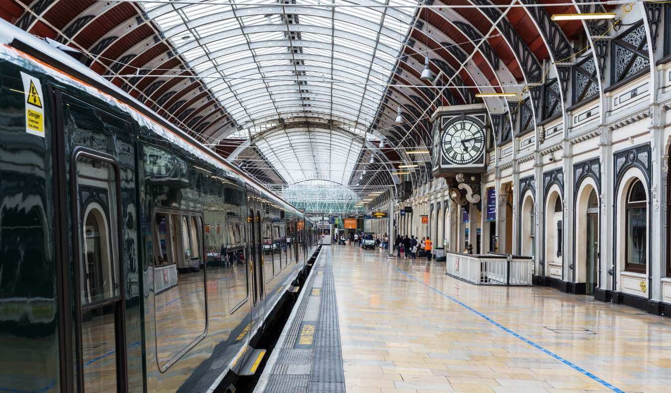A train sitting at a platform at London's historic Paddington Station