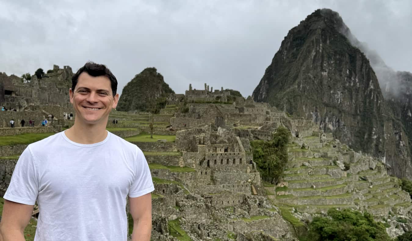 Nomadic Matt hiking in the Sacred Valley for beautiful Peru