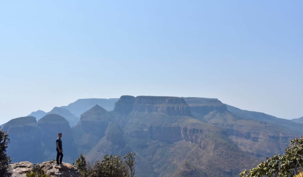 Nomadic Matt hiking the rugged hills and mountains of South Africa