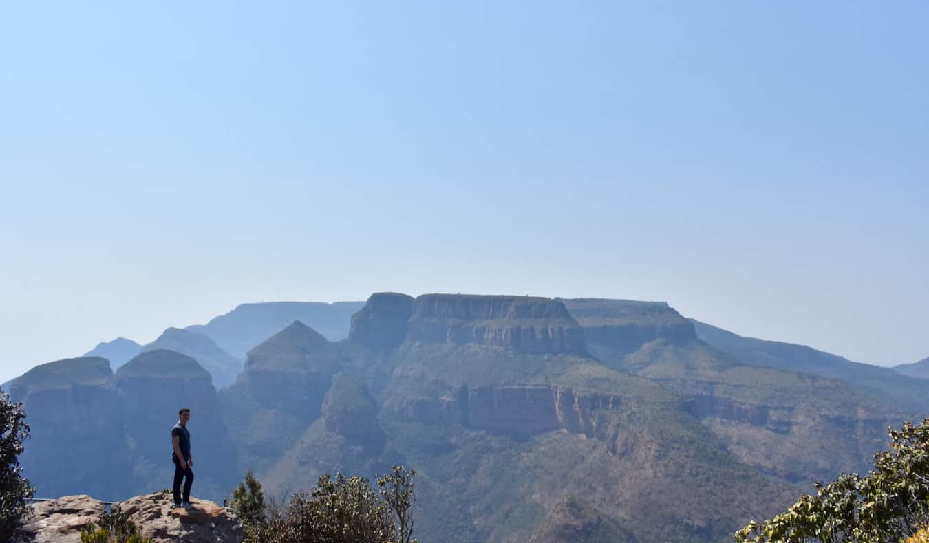 Nomadic Matt hiking the rugged hills and mountains of South Africa