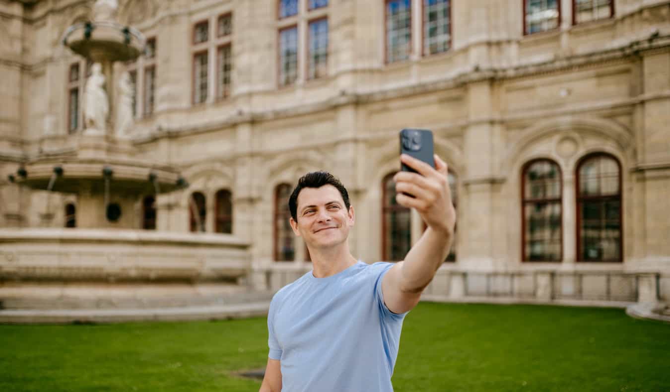Nomadic Matt taking a selfie in beautiful, historic Vienna, Austria