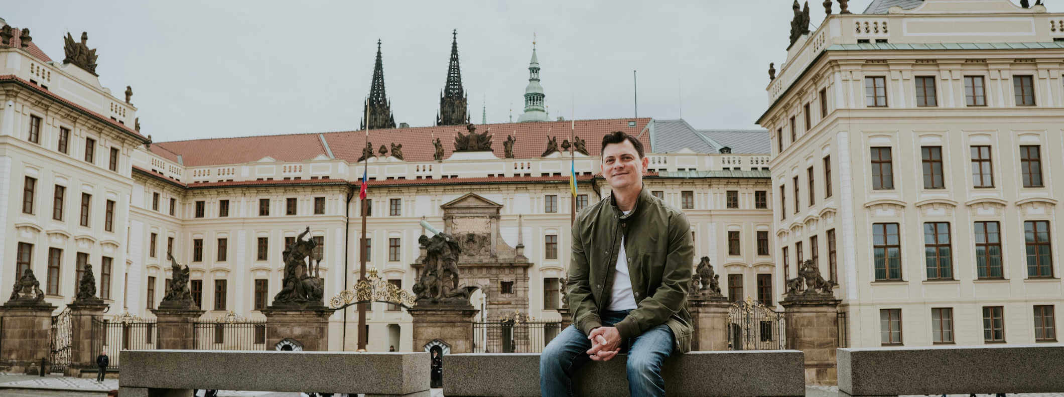 Nomadic Matt posing for a photo in historic Prague